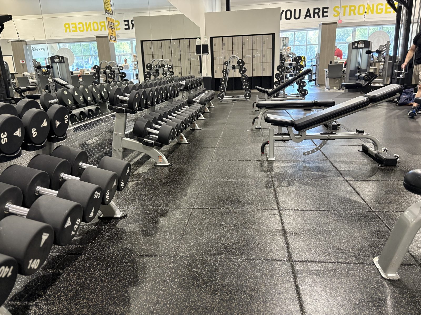 Dumbbell area with freshly mopped floor