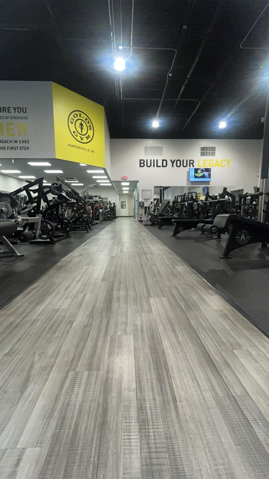 Gym corridor with gleaming plank floor